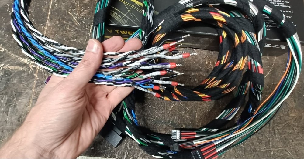 Vehicle-specific wiring harness prepared for a car audio installation